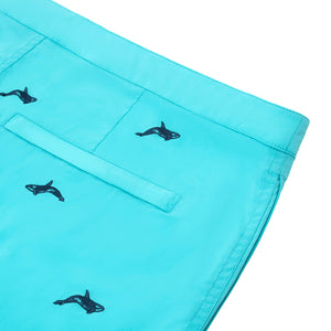 bright turquoise embroidered whales swim shorts